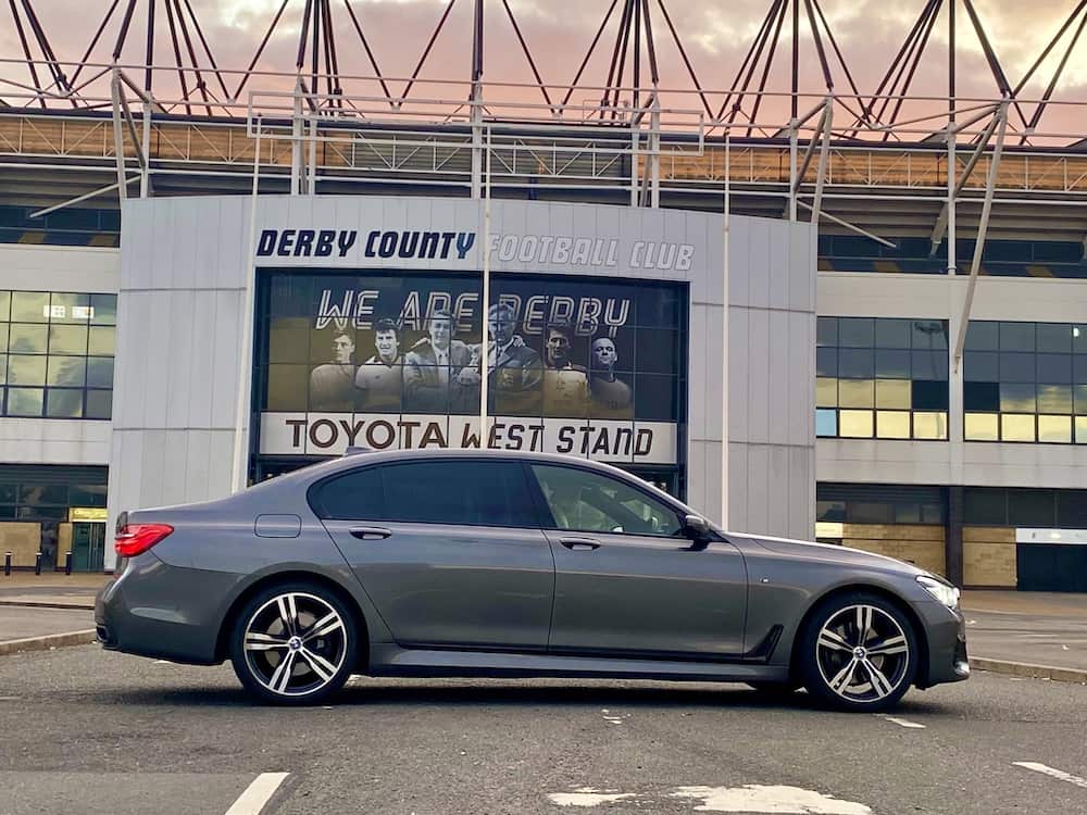 our Chauffeur Car BMW 7 Series in front of Derby County Stadium Pride Park