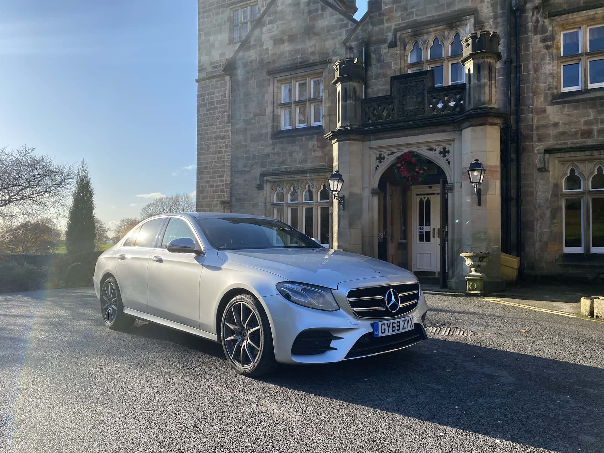 Mercedes E Class picking up at Breadsall Priory chauffeur hire in derby
