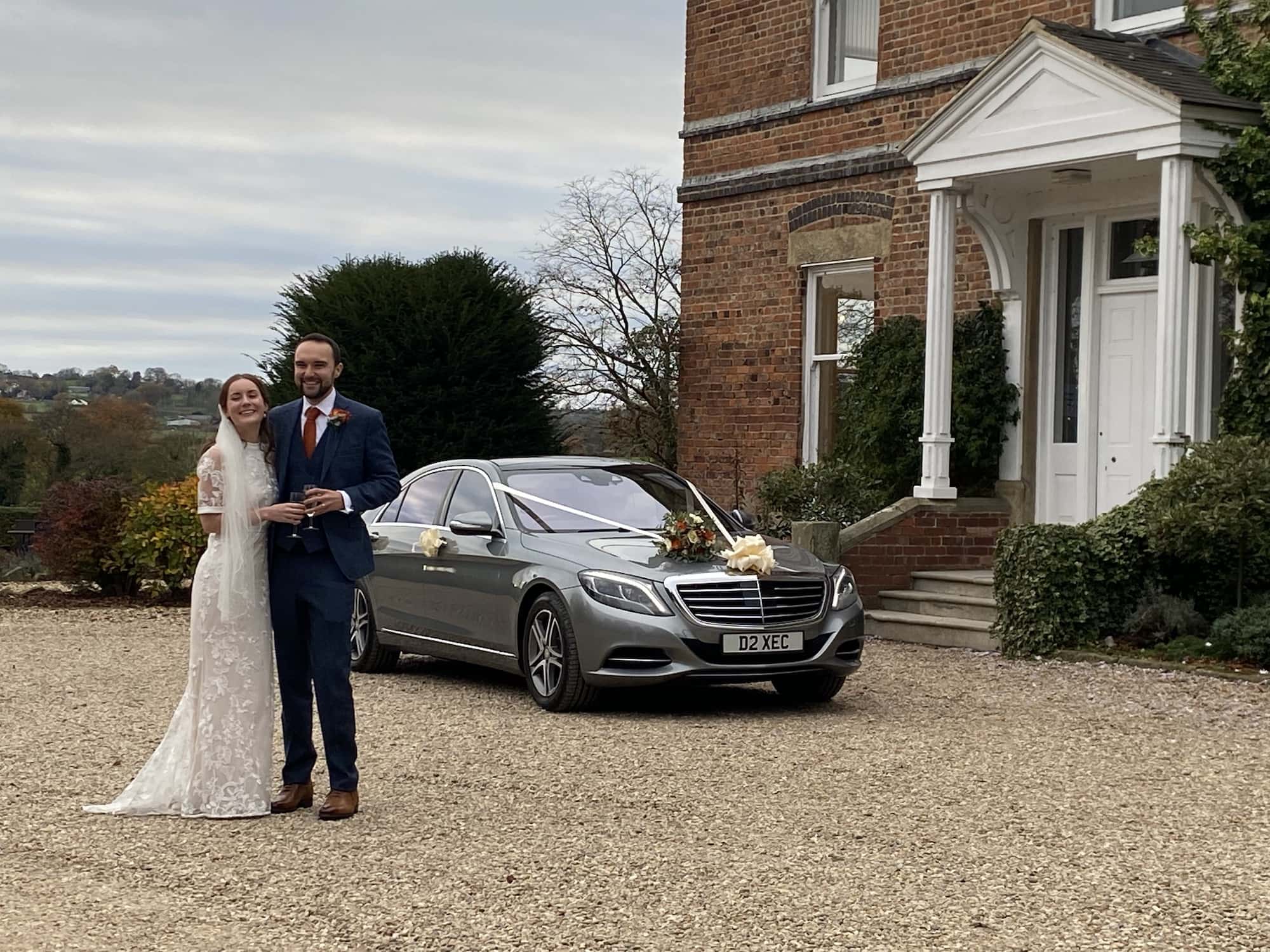 Bride and Groom with Mercedes S Class in Derby