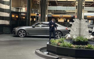 A52 Cars BMW 7 Series parked outside the Savoy Hotel in London