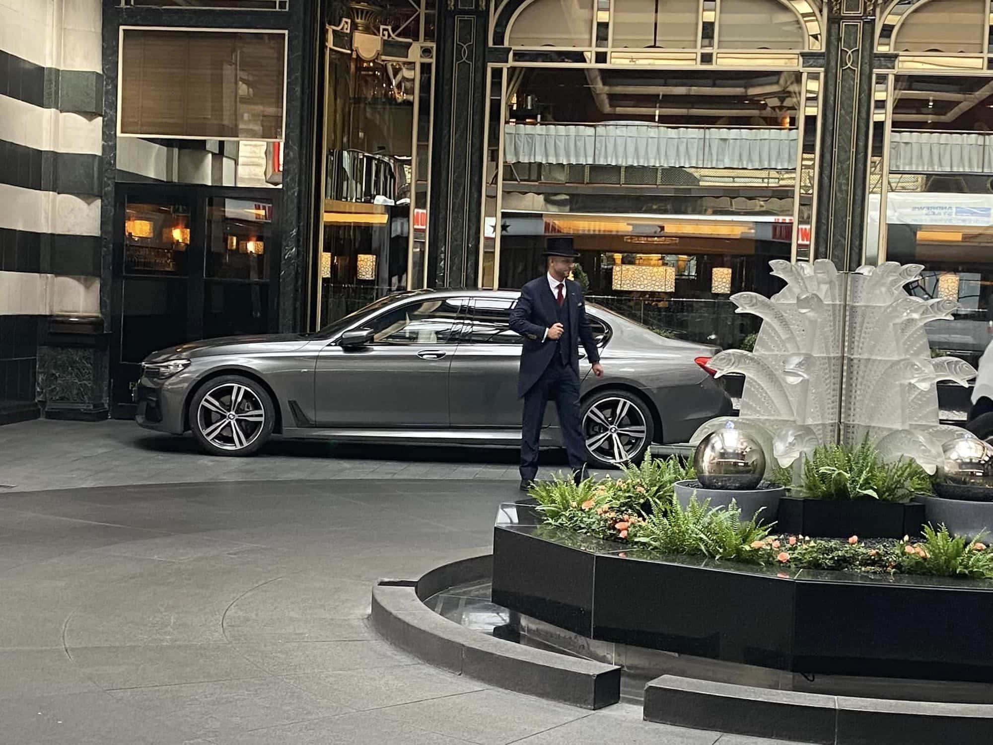 A52 Cars BMW 7 Series parked outside the Savoy Hotel in London
