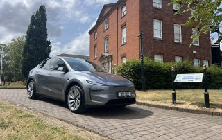 Quicksilver Tesla Model Y outside Long Eaton Town Hall