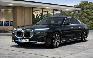 A Black BMW i7 in front of a smart house