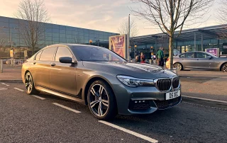 BMW 7 Series luxury chauffeur car used for executive airport transfers