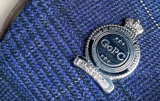 professional-chauffeur-guild-membership Guild of Professional Chauffeurs membership badge worn by driver